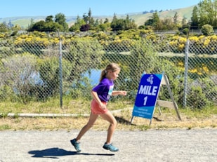 Girls on the Run participant pushes herself to the finish line! 